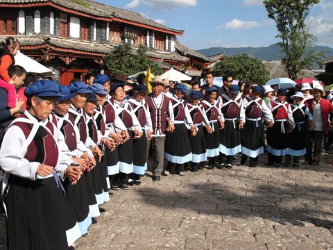 Die Naxi Nationalität, eine Minderheit mit der Bevölkerung von 320 000 in Südchina
